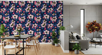 Apple blossom botanical wallpaper on dining area wall.