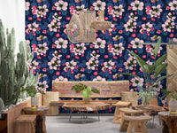 Apple blossom wallpaper with navy background.