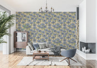Floral wallpaper with blue cornflower petals and green budding stems.