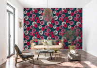 Vibrant pink wallpaper with dark navy leafy stems on a black background.