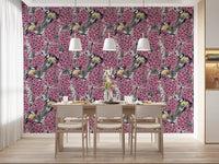 Birds wallpaper in a dining room featuring pink blooms and grey foliage.