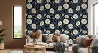 Living room wallpaper with dark blue foliage and white moonflower flower blooms.