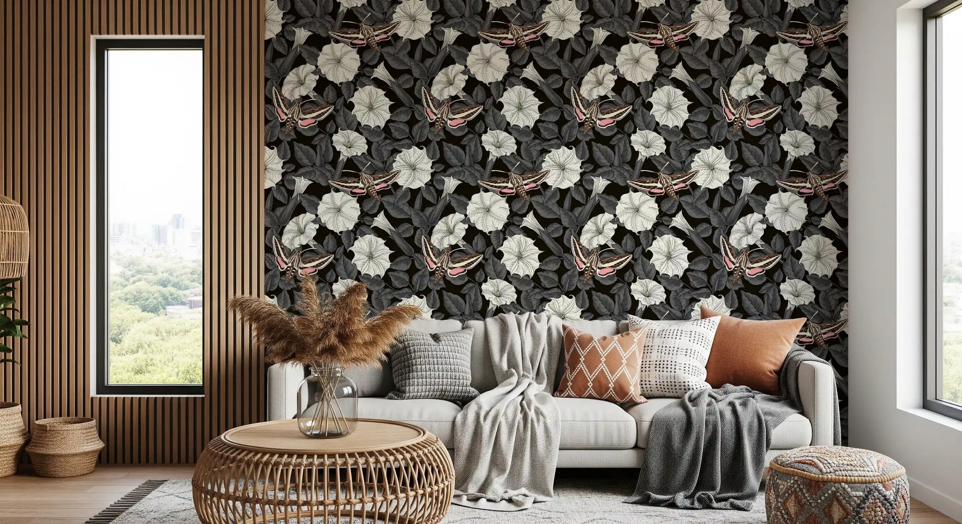 Sphinx moth floral wallpaper for a living room with grey leaf accents.