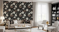 Sphinx moth and white floral pattern on grey leaf wallpaper.