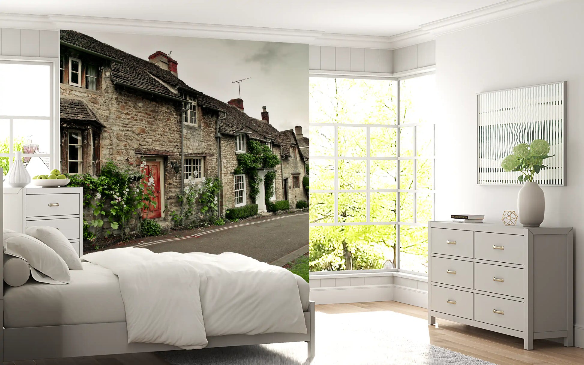 Bedroom wall mural depicting grey brick houses and white garden blossoms.