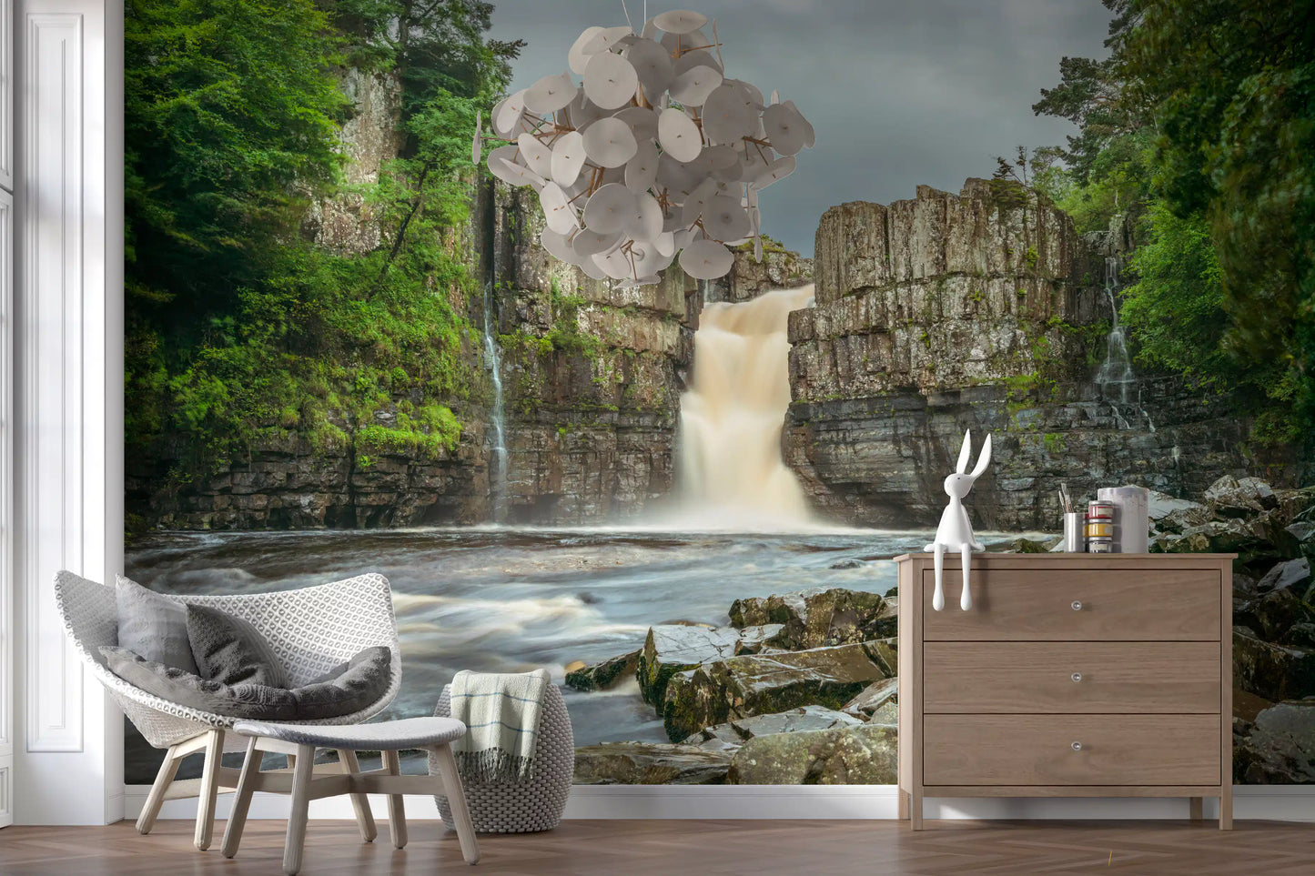 Grey cliff mural with rushing water and green vegetation for modern hallway.