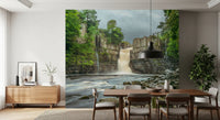 Emerald landscape wall mural with misty waterfall and overcast sky.