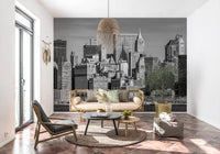 Grey city skyscraper wall mural for a bright hallway interior.