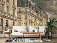 Dramatic wall mural showing classical windows and dark cloudy skies in grey tone.