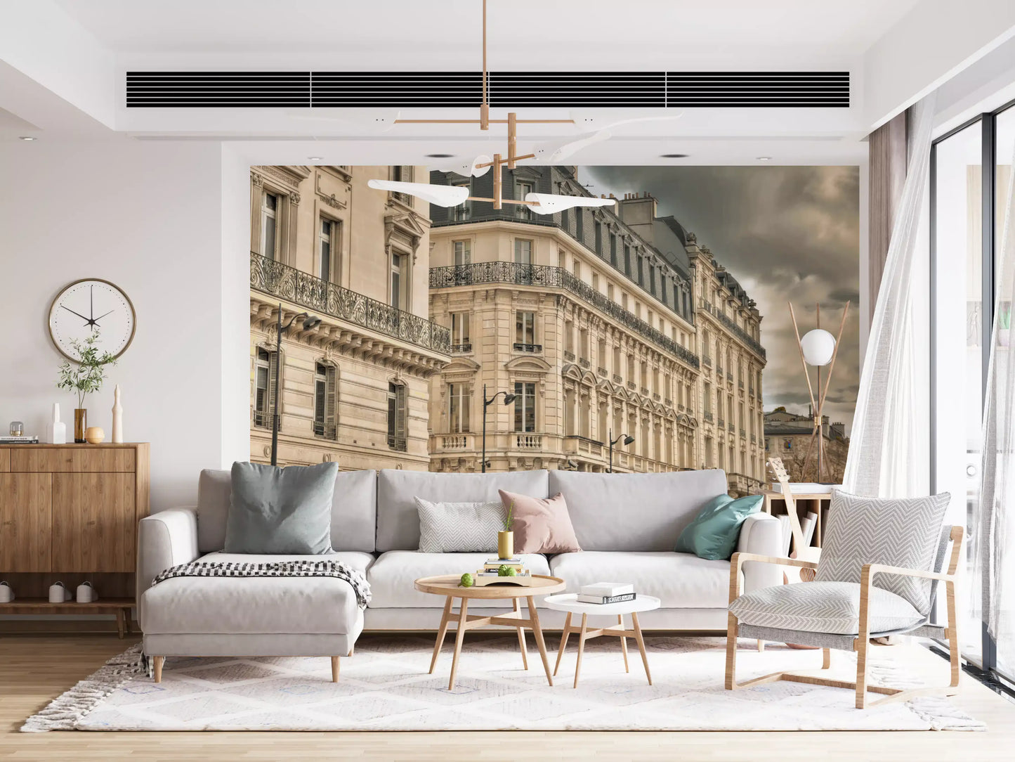 Detailed skies mural with black wrought iron railings and beige stone walls.