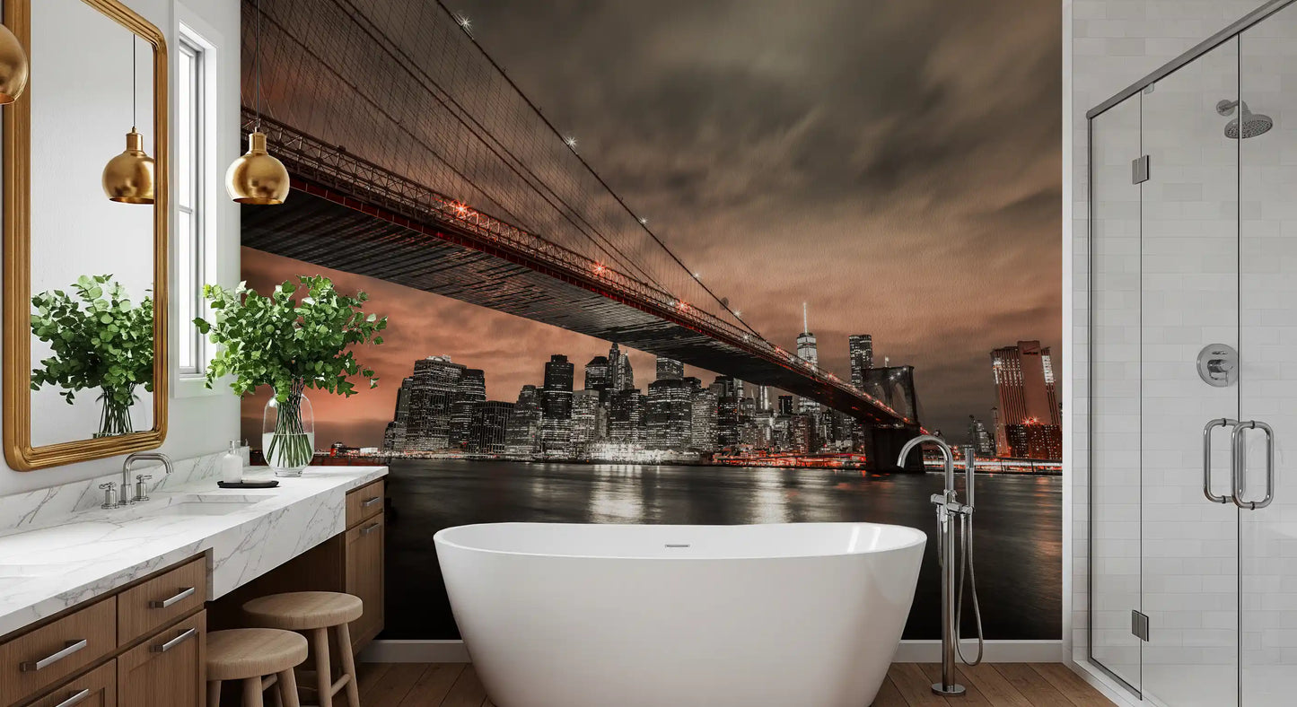 Brooklyn Bridge wall mural showing a night skyline and river reflections in an bathroom.