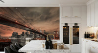 Iconic city wall mural with dark grey and orange tones for contemporary dining area.