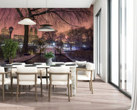 Pink twilight sky over a snow scene in this large landscape park wall mural.