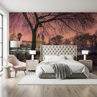 City towers behind a snow park bridge in a wall mural for a master bedroom.