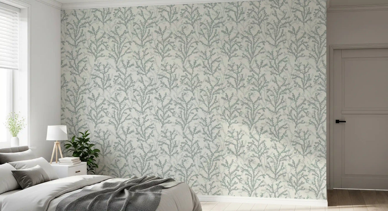 Minimalist greenish aquatic plant wallpaper for a sunlit bedroom.