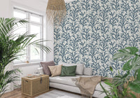 Teal coral branch patterns on a cream background with botanical wallpaper.