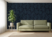 Painted Coraline Indian Teal Dark Wallpaper in a modern dark living room.