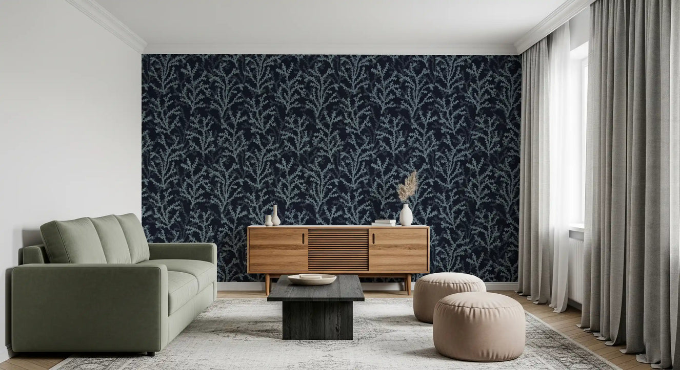 Slate dark wallpaper featuring light blue painted coral branch patterns.