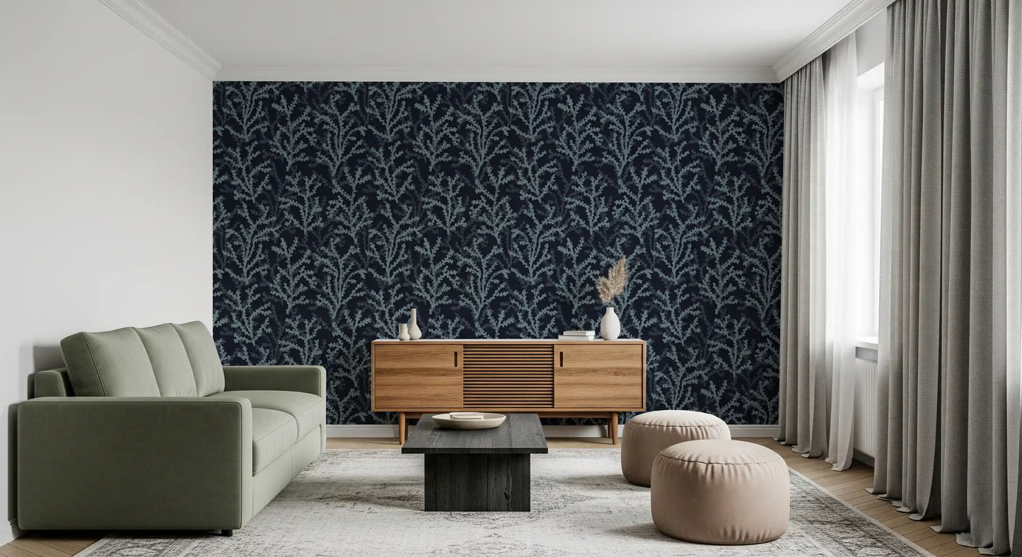 Slate dark wallpaper featuring light blue painted coral branch patterns.