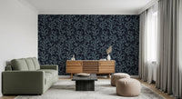 Slate dark wallpaper featuring light blue painted coral branch patterns.