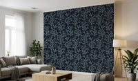 Coastal painted wallpaper featuring dark background and light blue flora.