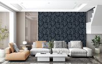 Coraline pattern wallpaper adding coastal dark blue elements to living room.