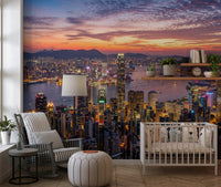 Twilight cityscape wall mural depicting modern high-rises and calm water inlet.