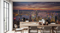 Victoria Harbour Twilight Wall Mural showing illuminated city skyscrapers and water.