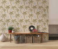 Olive palm trees scattered across cream with blue brushstrokes on this wallpaper, GD9901