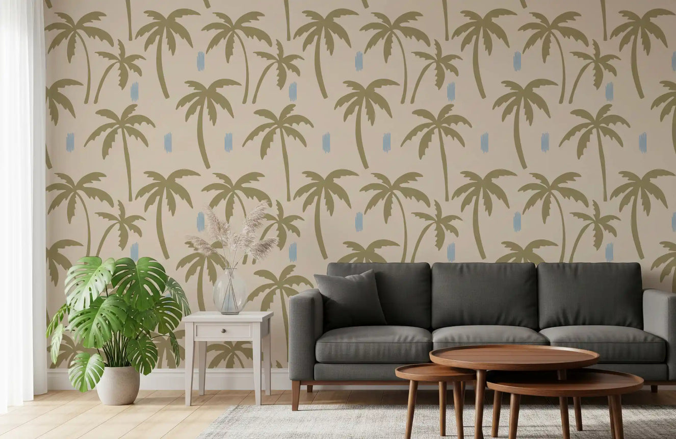 Living room walls carry soft palm silhouettes from boho coastal wallpaper