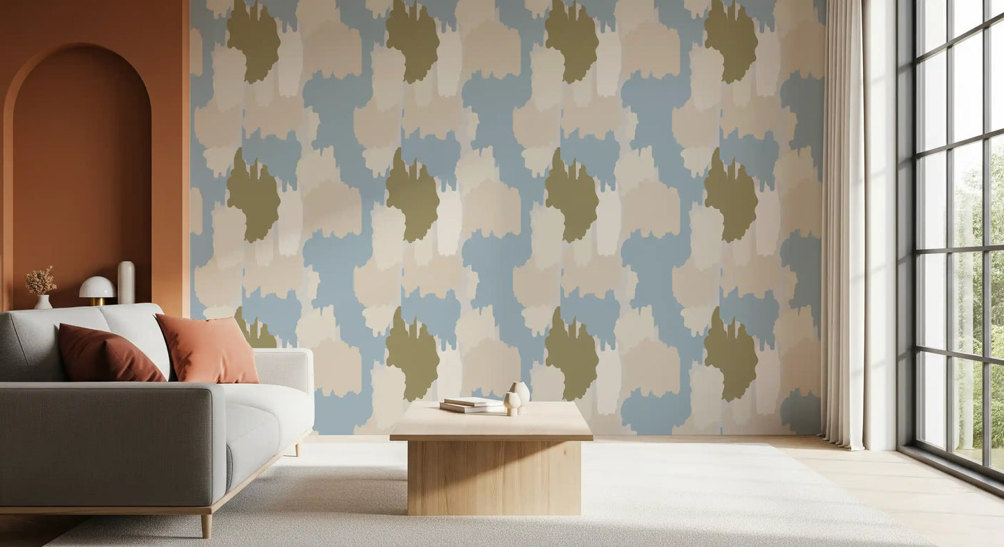 Layered cloud forms give the soft blue coastal wallpaper a relaxed rhythm.