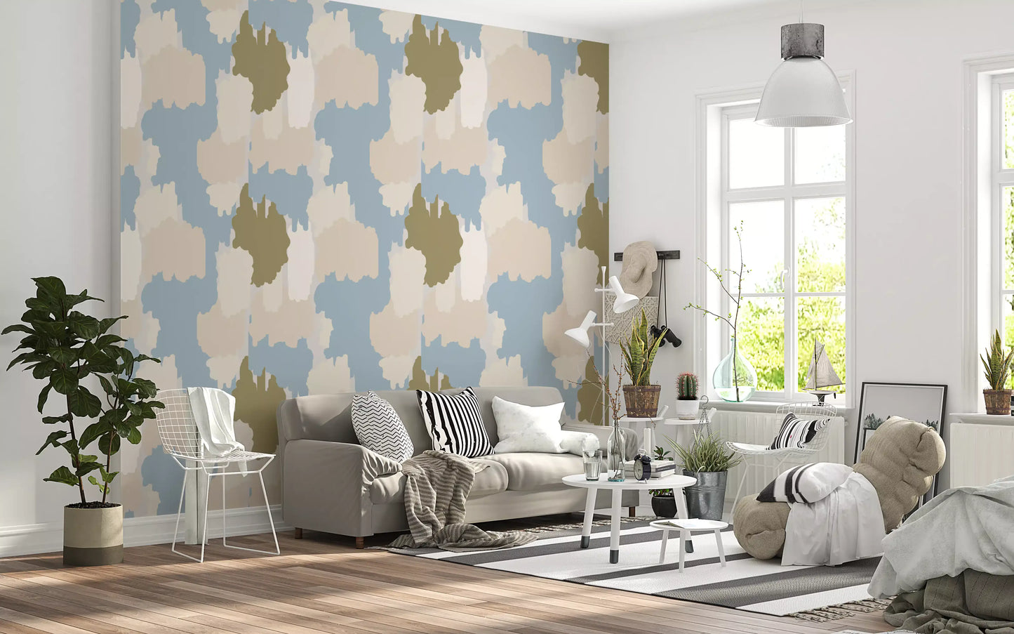 Soft blue boho coastal wallpaper layers cloud-like shapes in muted neutrals.