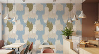 Cafe area gains a quiet, sun-bleached mood with this abstract coastal wallpaper.
