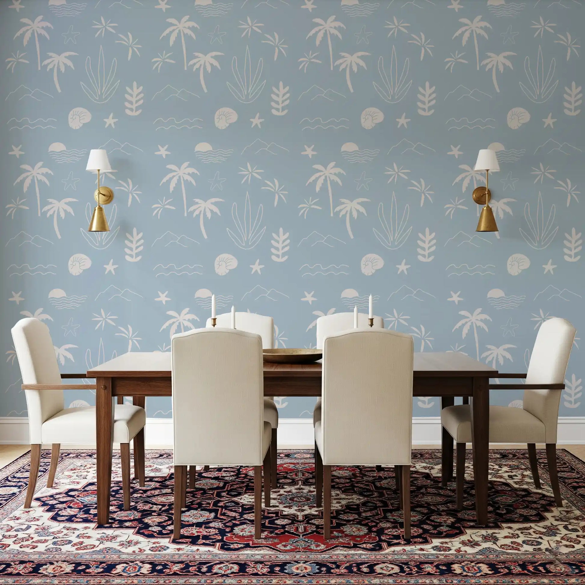 Tropical fronds and shell sketches dress a dining room in soft blue coastal wallpaper., GD9908