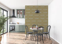 Dining room feels playful behind this olive wave boho coastal wallpaper.
