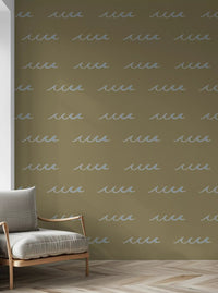 Hallway gains slow movement from olive green coastal wave wallpaper.