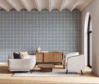 Living room styled with soft blue grid wallpaper, a wooden table and a woven storage basket., GD9913