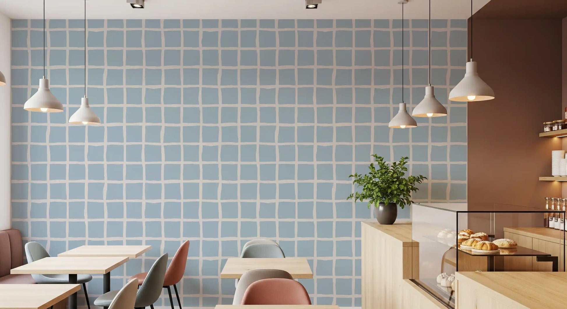 Dining room feature wall in soft blue painterly grid wallpaper with wooden table and chairs., GD9913