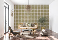 Minimalist khaki wallpaper featuring an abstract, loose checkered pattern.