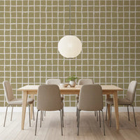 Muted olive green squares defined by organic white lines on this coastal wallpaper.
