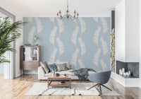 Calm living room featuring the Soft Blue Banana Leaf Boho Coastal Wallpaper, GD9917