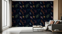 A wide view showing the full pattern of the painted leaves wallpaper.
