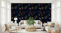 Vibrant botanical elements across the tropical painted dark wallpaper.