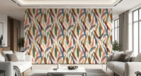 Living room showcasing the tropical painted foliage wallpaper with sweeping leaves., GD9928