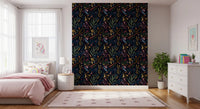 Abstract geometric fragments are interspersed on dark painted wallpaper
