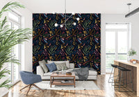 An entryway looks bold with the Tropical Painted Collage wallpaper