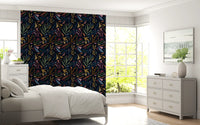 Add depth to your bedroom using the dark Tropical Painted wallpaper.