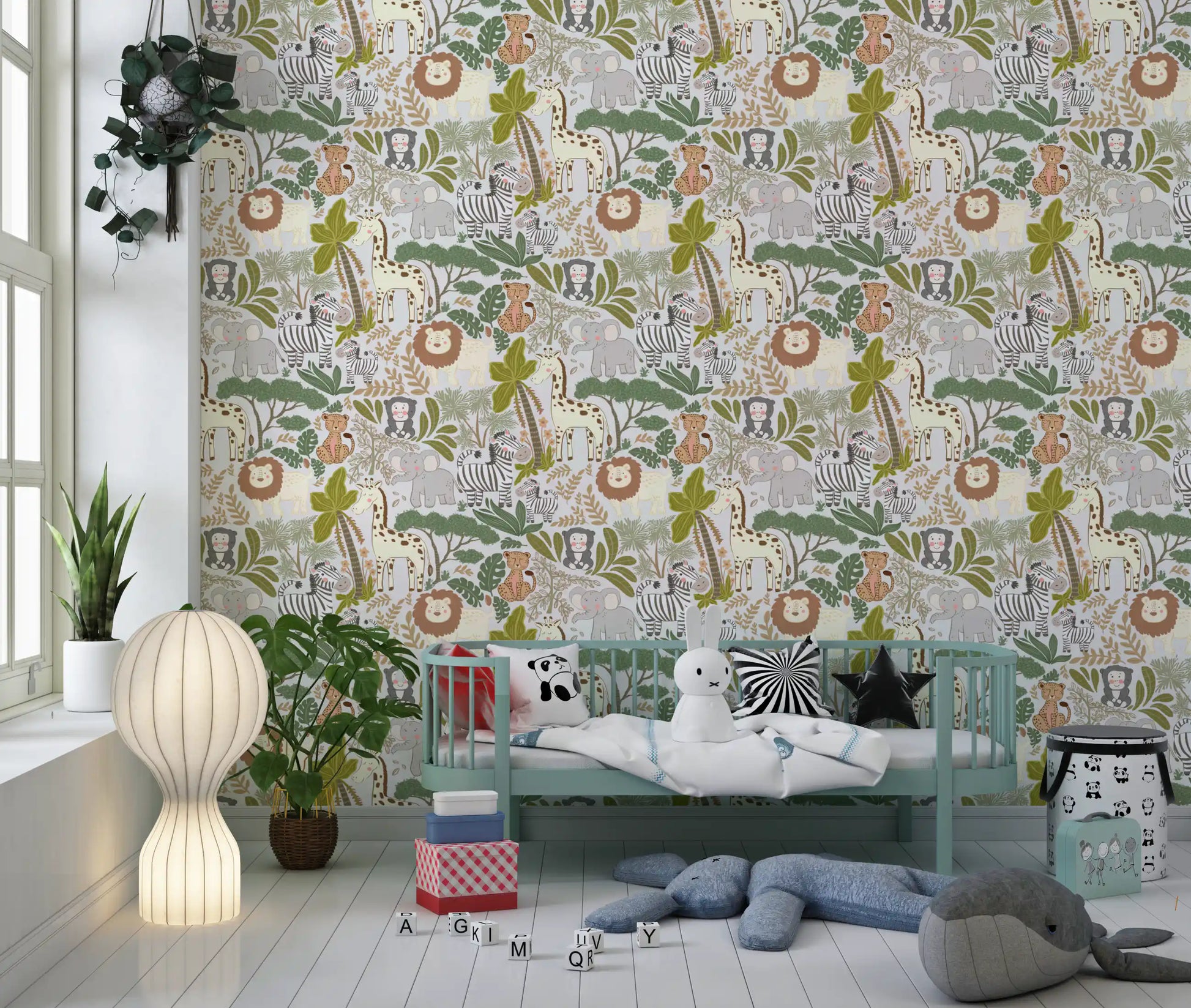 Detailed safari animal wallpaper placed within a cozy nursery space.