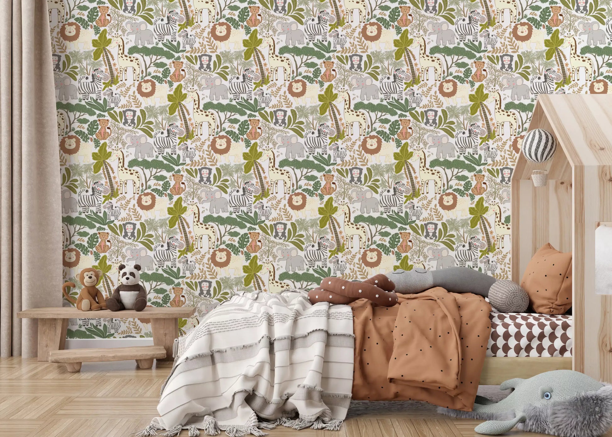 Illustrated safari wallpaper as an accent in a modern toddler bedroom.