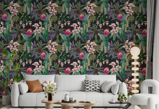 Living room walls covered in the Tropical Macaw & Orchid wallpaper.